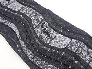 曲線色紙に雪輪・花々・梅唐草模様織出し名古屋帯